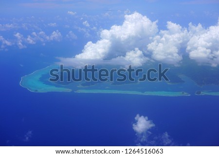 Aerial view of the island and lagoon of Raiatea (Ra'iatea) near Tahiti in French Polynesia, South Pacific