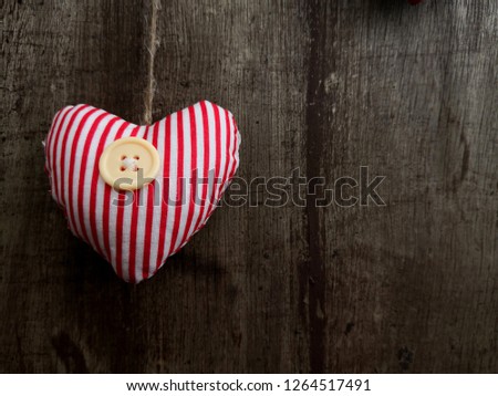 Love design and decoration hanging on vintage wooden. Valentine background.