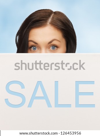 picture of lovely woman with sale billboard