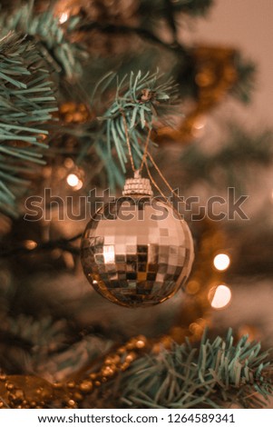 Gold Christmas Bauble on Tree