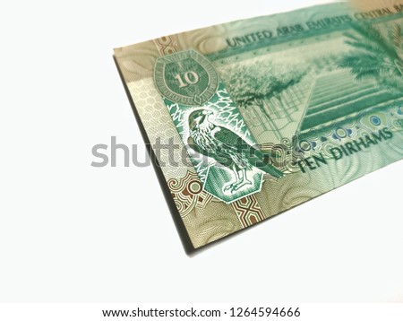 closeup a UNITED ARAB EMIRATES CENTRAL BANK 10 Dirhams/Money over white background with selective focus.