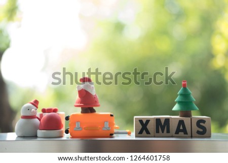 Christmas ornaments with letters spelling XMAS. Festive Christmas concept