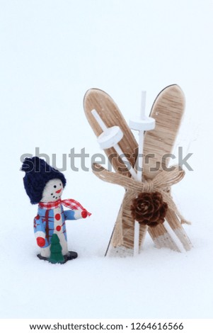 snowman going skiing