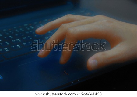 Illustrated blurry young hand on keyboard