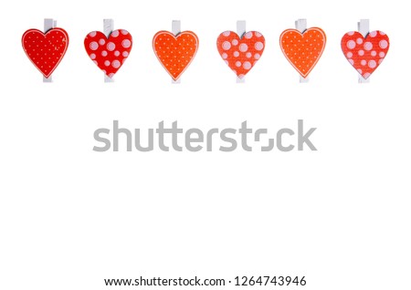 Clothespins heart for notes paper on white background isolation