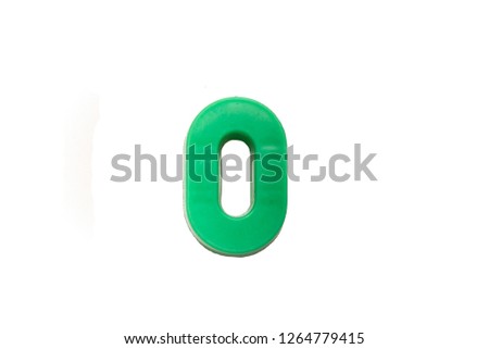 Letters and numbers isolated on white background . Alphabet . Magnetic letters and numbers