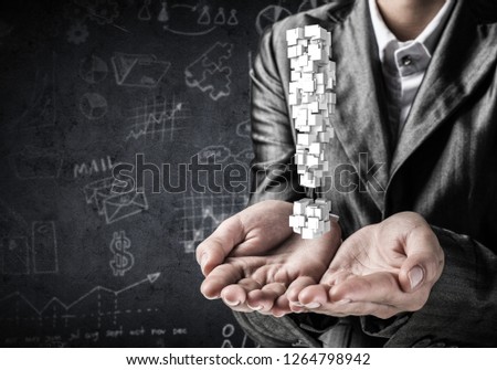 Cropped image of businessman in suit presenting multiple cubes in form of exclamation mark in his hands. 3D rendering.