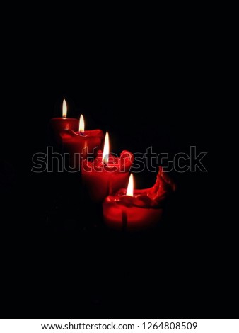 red candles in the christmastime