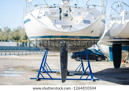 boat on repair in dry dock. Propeller. Athens, Greece Royalty-Free Stock Photo #1264810504