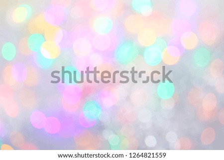 Сolor spots and grey, the effect of light background blur clouds. Christmas background in winter. Evening magical lighting.