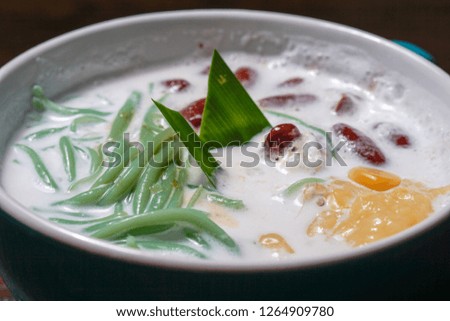 Cendol is an iced sweet dessert that contains droplets of worm-like green rice flour jelly, coconut milk and palm sugar syrup.