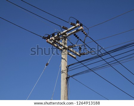 High-voltage wires on the pole three phase, three-phase AC power cable, high-pressure connections and the power cords on electrical insulators prevent electricity leakage or short-circuit to ground.