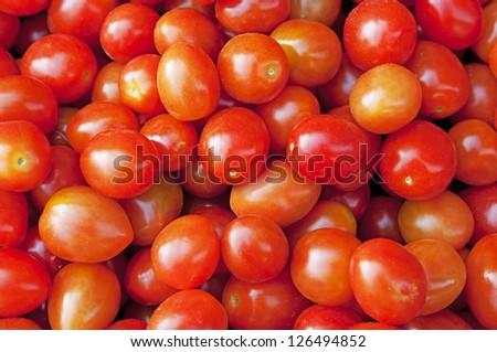 cherry tomatoes as a background.
