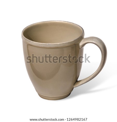 Beautiful and diverse subject. Beautiful vintage and vintage creative cup and mug of glazed glossy enamel and glaze on a white isolated background.