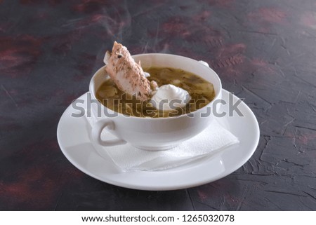 Beef bouillon with meat on a bone 