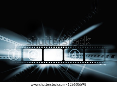 Dark cinema background with a camera film.
