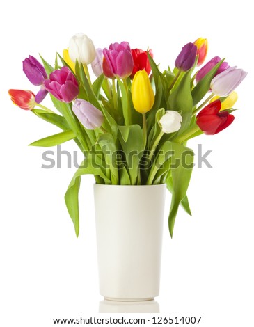 Multicolored tulips in a vase, isolated on white background Royalty-Free Stock Photo #126514007
