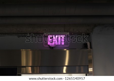 purple color exit sign