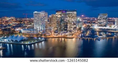 The buildings are illuminated in the downtown urban core of Baltimore Maryland