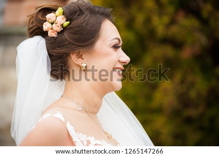 Beautiful european smiling bride in wedding dress