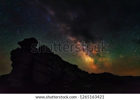 The fiery galaxy Milky way in the night sky with millions of stars over the White Elephant Observatory, which is in the Ukrainian Carpathian Mountains