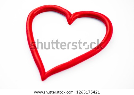 Heart symbol closeup. Symbol of love, Valentine's day. The background is white. Copyspace
