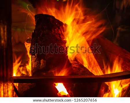 Long exposure of a fire place, texture of fire, flame details, nightshot