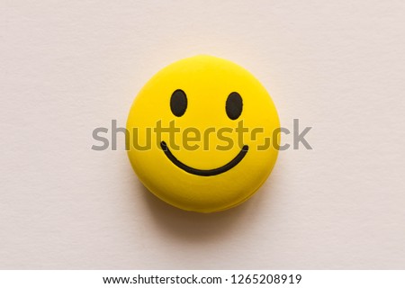 Funny smiley face on white background. Positive mood Royalty-Free Stock Photo #1265208919