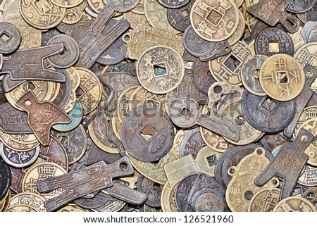 Variety of ancient Chinese coins with different forms and shapes Royalty-Free Stock Photo #126521960