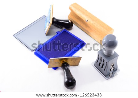 STAMPER WITH STAMP PAD ON WHITE ISOLATED BACKGROUND