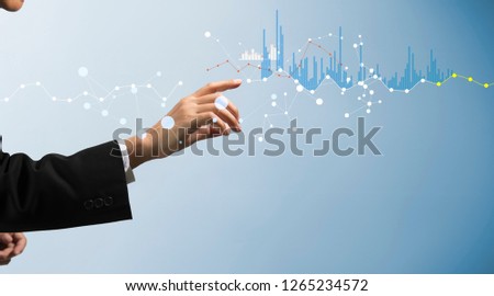 Businessman touching virtual screen, data analytics concept