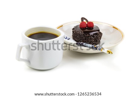 Hot coffee, dessert cake with chocolate icing and cherry on a saucer, isolated on white background