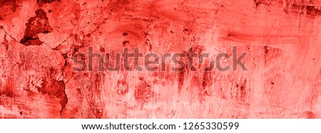 texture of old concrete dyed color living coral paint.Color of the year 2019 concept. Living Coral abstract background.  cracks and streaks. text box.  background for lettering. background for calligr