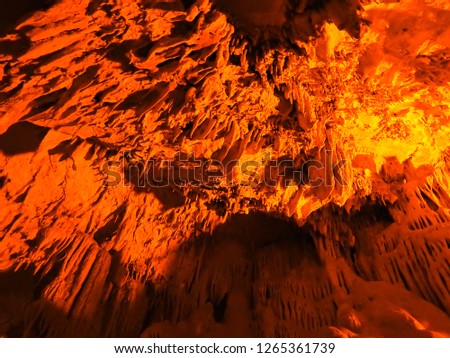 Dim cave (magarasi) inside the Taurus mountains. Natural underground patterns