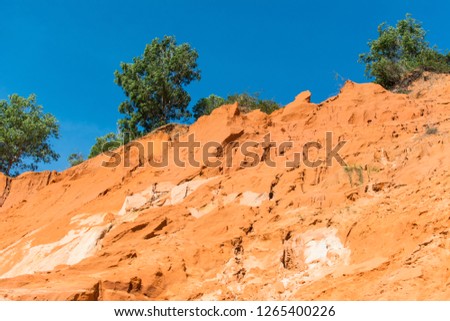 Fairy Stream Canyon, The muddy waters of the Fairy River (Suoi Tien) with red river, Tropical oasis scenery of hills with limestone, sandstone plateaux. Popular and famous landmark of Mui Ne, Vietnam