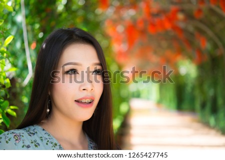 Portrait of beautiful asian woman,Thailand people,Lovely girl take a picture