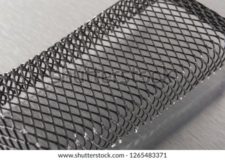 black metal mesh on white background