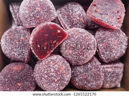 Close up raspberry marmalade background. Fruit jelly candy, stock photo