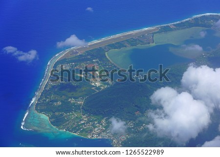 Aerial view of the Huahine Fare Airport (HUH), a small airstrip on the island and lagoon of Huahine near Tahiti in French Polynesia, South Pacific