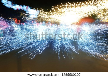 A picture of light trail from four Christmas tree in Kuala Lumpur.