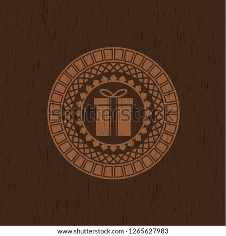 gift box icon inside wood emblem. Retro