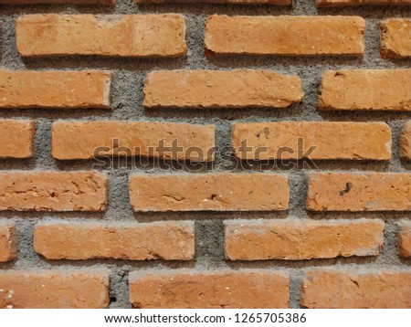 Brown brick wall for background, wallpaper.