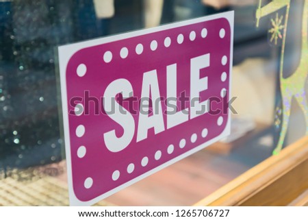 Sale sticker on wondow shop. Season discount shopping. 