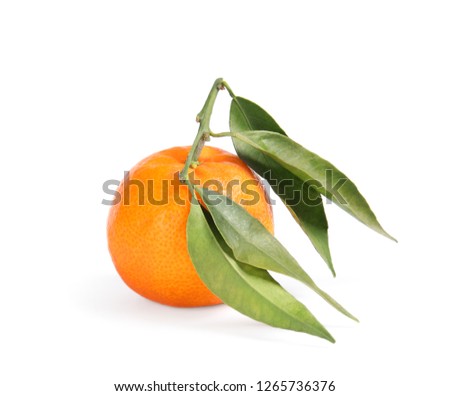 Tasty ripe tangerine with leaves on white background