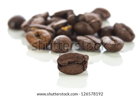 Coffee beans close up on white