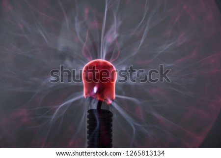 glowing plasma ball with pink and purple flashes