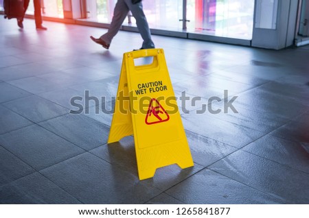 "Caution wet floor" sign