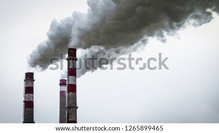 Industrial factory pipe smoke. Vaporizing toxicity. Royalty-Free Stock Photo #1265899465