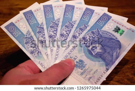 Polish zloty in hand. (hand of the author of the photo)