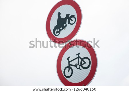 No bicycle or motorcycle. Cloudy sky in the background. - Image